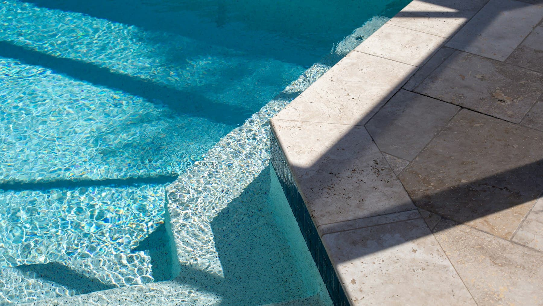 Drained swimming pool ready for resurfacing in San Diego