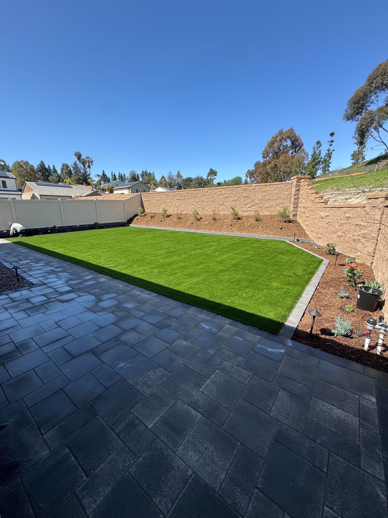 Luxury landscape design and installation with turf, pavers, and planting in San Diego by Modern Yardz