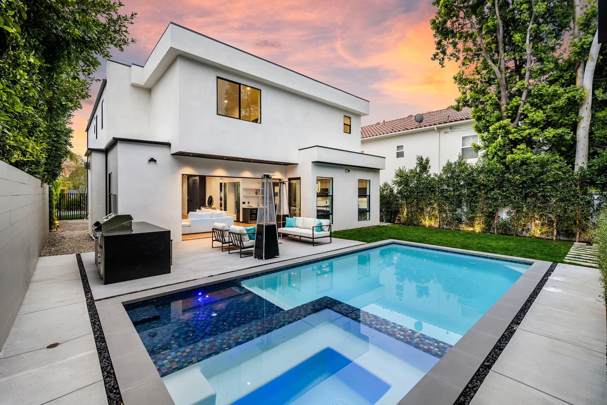 Evening landscape lighting with paver patio San Diego