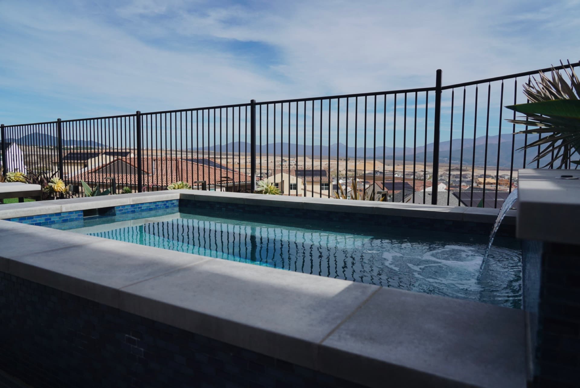 Raised spa with sweeping valley views, designed and built by Modern Yardz in Chula Vista, San Diego County