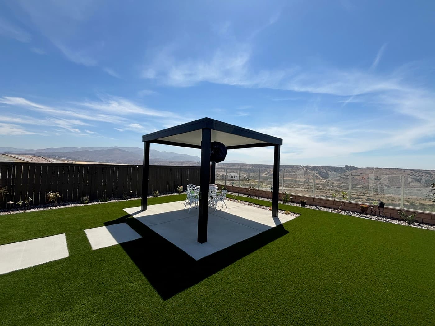 Louvered pergola with panoramic views in Chula Vista by Modern Yardz