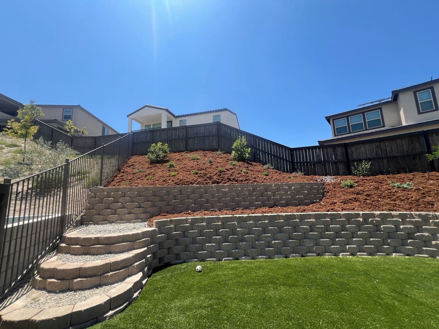Engineered retaining walls on a hillside lot in Chula Vista by Modern Yardz