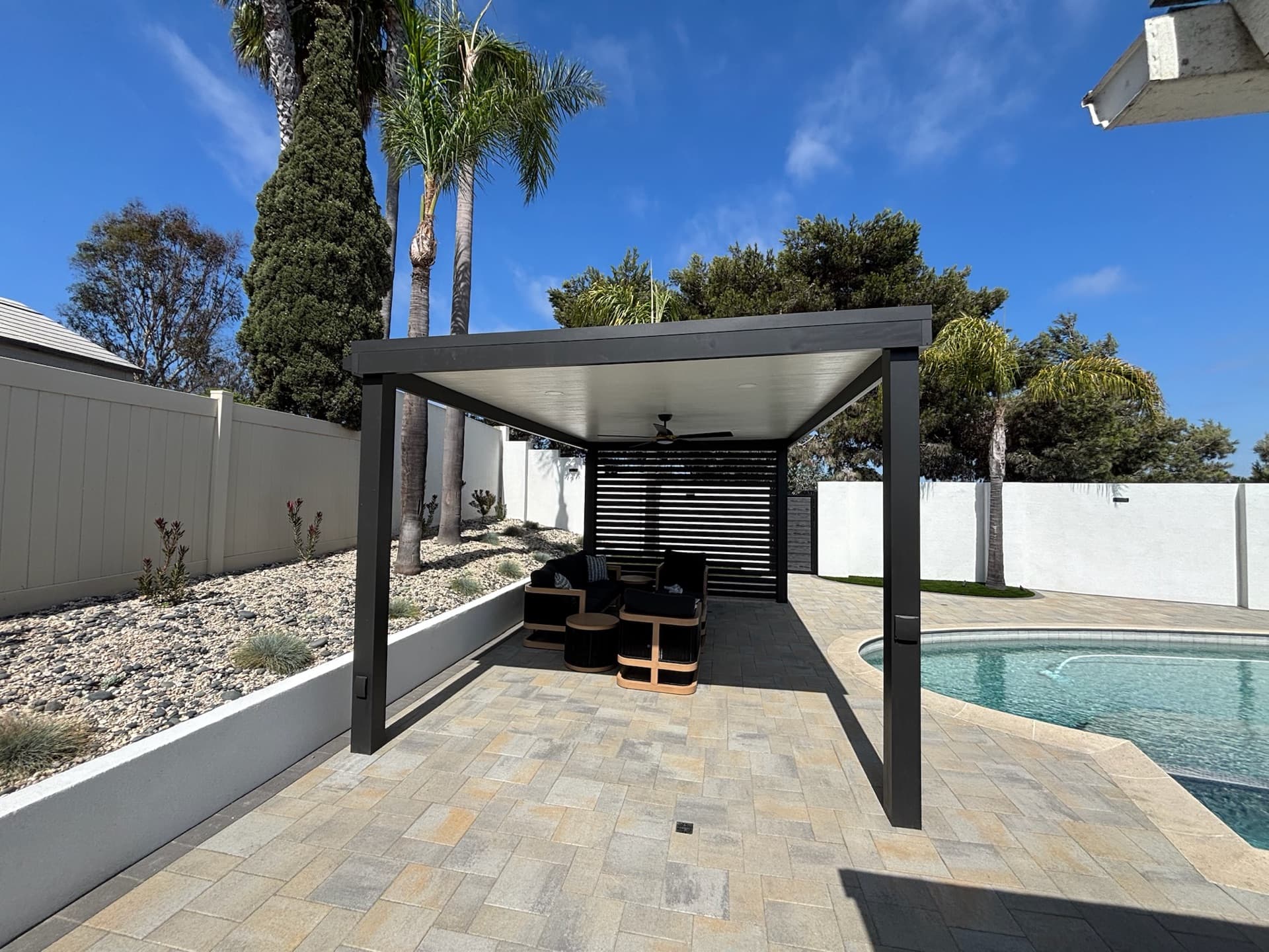 Resort-style pool and outdoor living space, designed and built by Modern Yardz in Point Loma, San Diego County