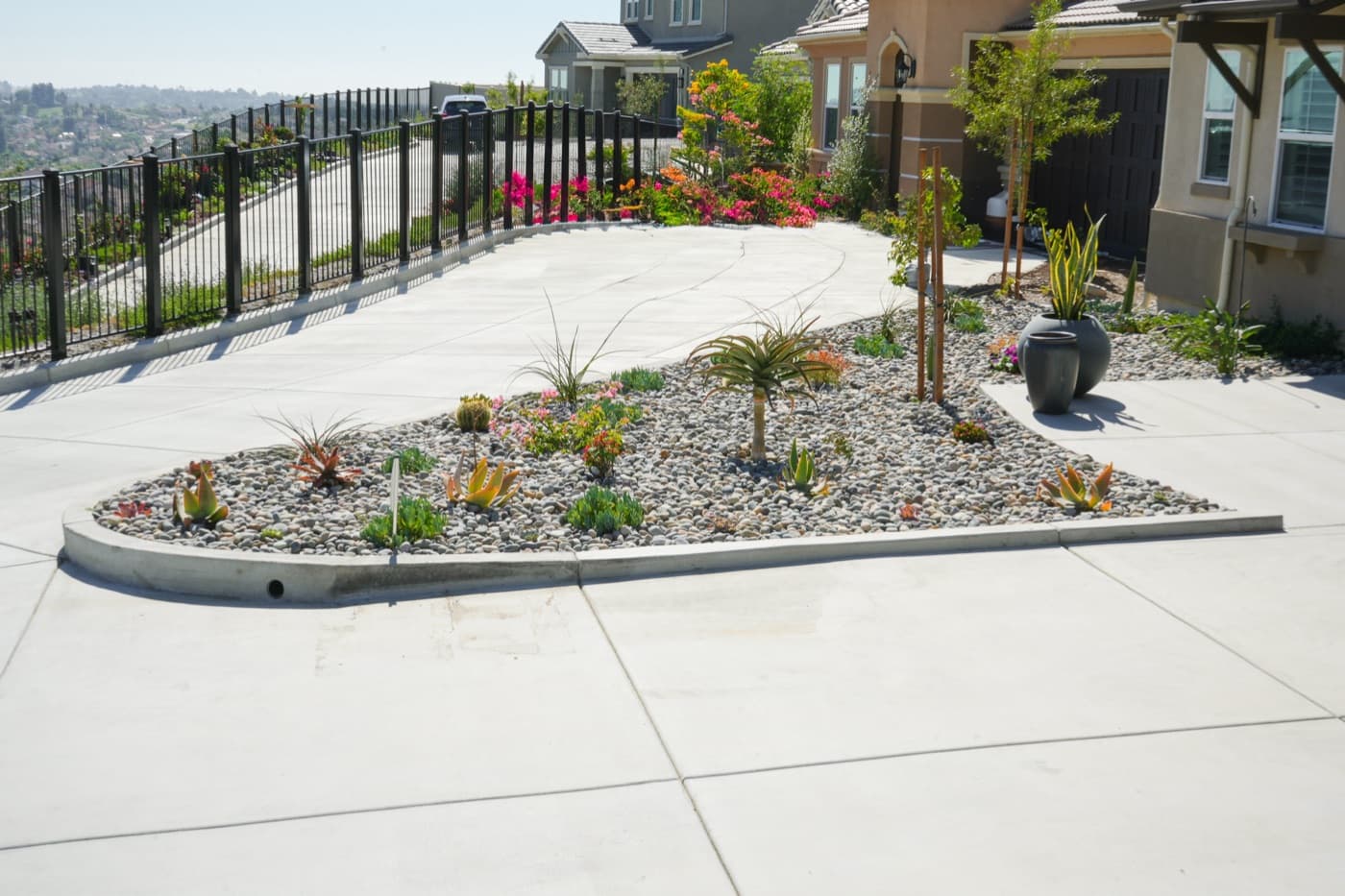 Paver patio with landscape lighting at dusk in Encinitas by Modern Yardz
